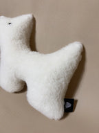Soft cashmere plush pet toy featuring textural cashmere material, ideal for all pets of all sizes. 