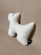 Soft cashmere plush pet toy featuring textural cashmere material, ideal for all pets of all sizes. 