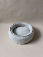 Soft wool alpaca pet bed, plush with a neutral color, ideal for small pets.