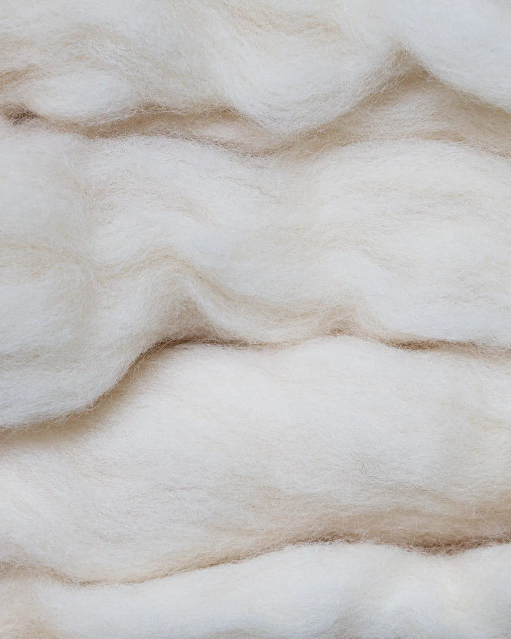 Soft wool and cashmere featuring plush material.