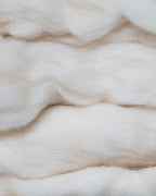Soft wool and cashmere featuring plush material.