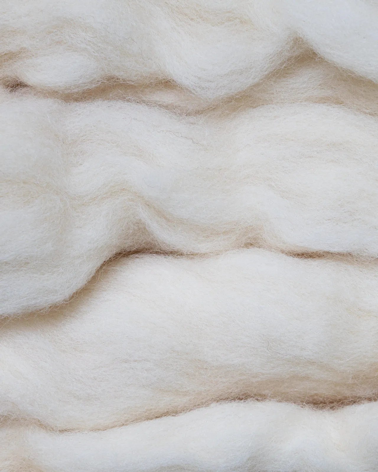 Soft wool and cashmere featuring plush material.