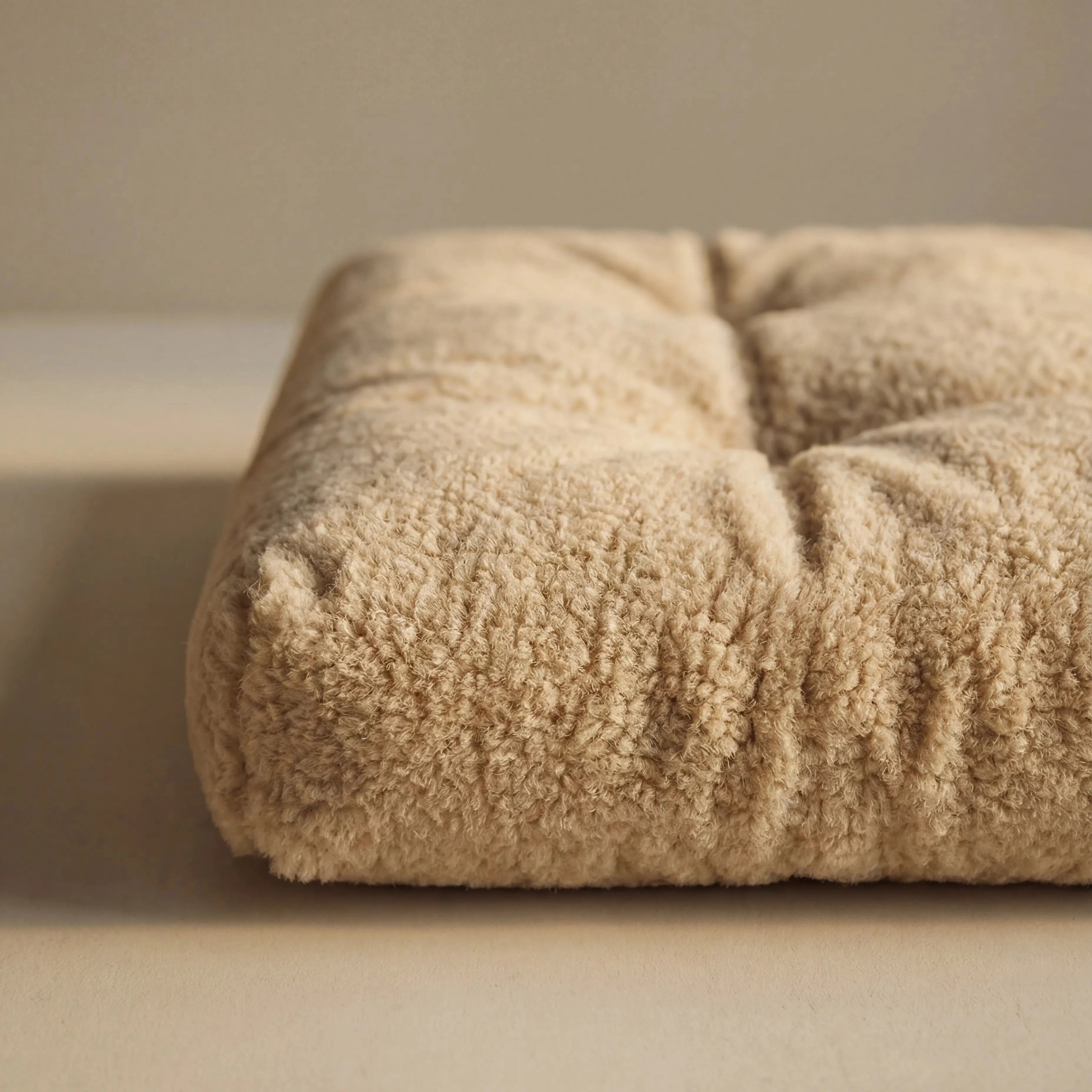 'Wool Lounge Boucle Pet Bed' on a neutral background.