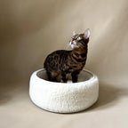Wool Sheep Bouclé Pet Bed with soft, textured fabric and cushioned interior for pets.