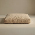 Beige 'Wool Lounge Bouclé Pet Bed' on a neutral background.